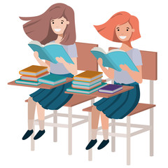 young student girls reading in school desk