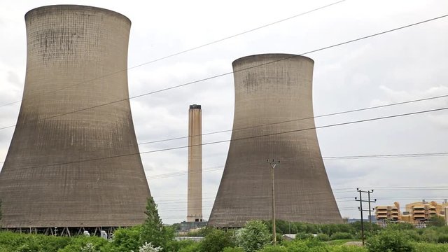 Huge cooling towers and chimney of power station