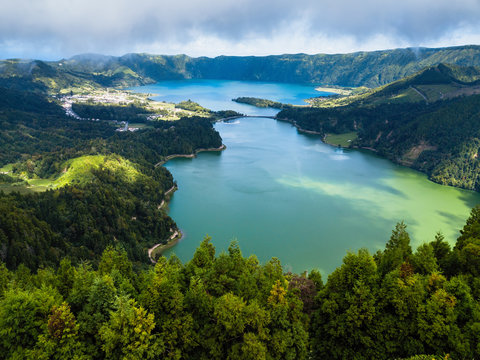 Aerial view of Lagoa Verde and Lagoa Azul - lakes in Sete Cidades volcanic craters on San Miguel island, Azores, Portugal.