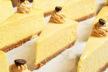 Slice of NY style Cheese cake on buffet table 