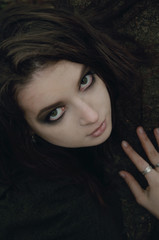 portrait of a young woman with bright makeup in Halloween style