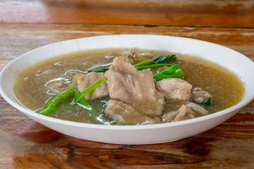 Fried noodle with pork and broccoli.