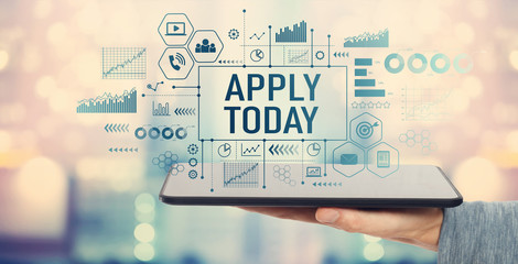 Apply today with man holding a tablet computer