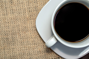 Black coffee in a cup top view
