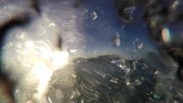 swimming hands in the waves