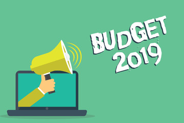 Writing note showing Budget 2019. Business photo showcasing New year estimate of incomes and expenses Financial Plan.