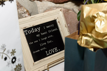 framed saying at a wedding