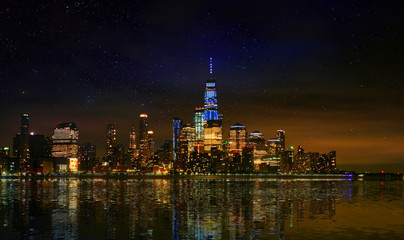 Fototapeta na wymiar Manhattan downtown skyline with urban skyscrapers over Hudson river ,Manhattan Skyline at night.