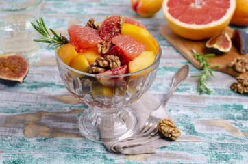 Salad from different raw fruits