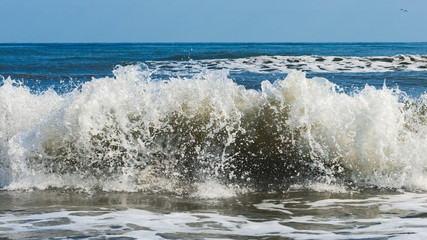 Powerful sea waves breaking, natural background
