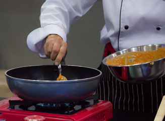 Chef preparing food, meal, in the kitchen, chef cooking, Chef decorating dish, closeup, .chef at work.
