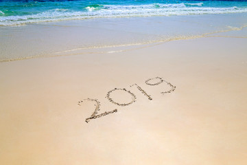 Happy new year 2019, write on the beach
