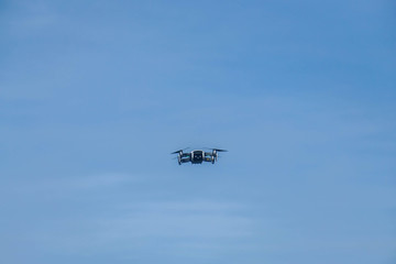 flying drone in the blue sky