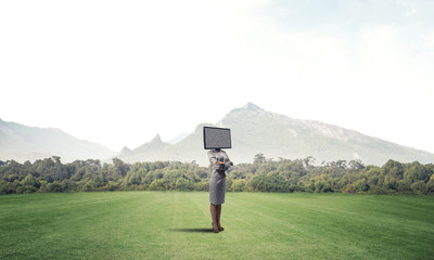 Business woman with TV instead of head.