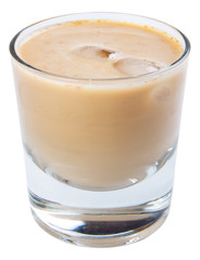 irish cream alcohol cocktail with ice in a short glass. isolated on a white background