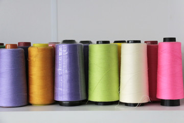 in a front row of thread in spool