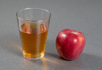 apple and glass of juice