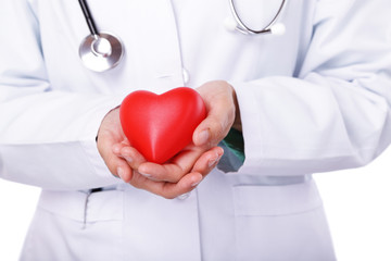 Health concept: Unrecognizable doctor holding a red heart