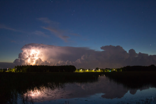 Thunderstorm cloud early in the morning, in summer before sunrise
