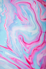 Abstract colored background. Stains of paint on the water. Ebru art, marbled paper.