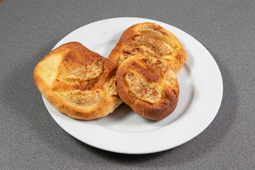 Buns on a white plate