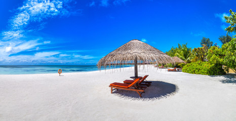 Fototapeta premium Sunbed and umbrella in the Maldives