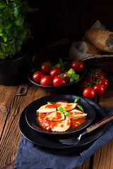 rustic Delicious Pasta - Ravioli in tomato sauce with basil