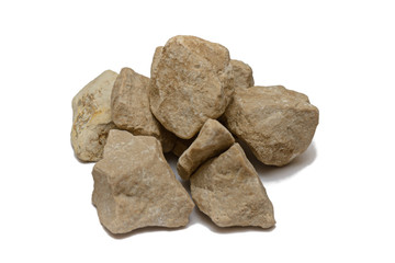 heap of several light stones on white background