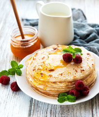 Delicious pancakes with raspberries