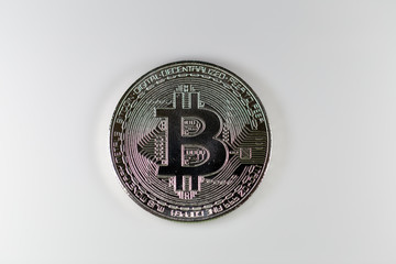 Bitcoin token isolated on white background. Cryptocurrency concept with copy space.