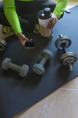 Dumbbell and mat training at home,