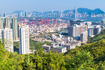Naklejka premium Hong Kong view with its ports and sea commerce trading