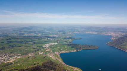 Obraz premium aerial view of beautiful lake lucerne switzerland europe on calm sunny day