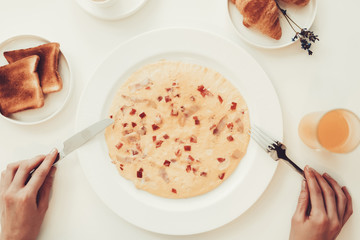 6764236 Hands With Knife And Fork. Breakfast Concept.