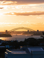 Naklejka premium Sydney Harbour Bridge under the sunset light.