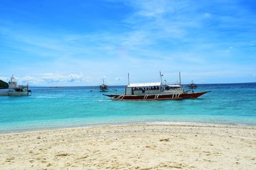 Obraz premium A Boat Near Sumilon Island, Phillipines