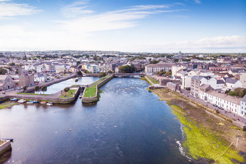 An aerial view of the River Corrib, the Claddagh Basin and the street known as The Long Walk in Galway, Ireland. - obrazy, fototapety, plakaty