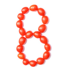 Number eight. The figure is made of tomatoes on a white isolated background.