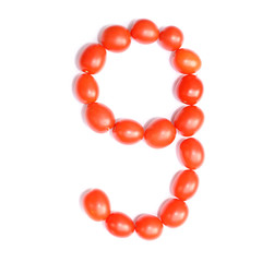 Number nine. The figure is made of tomatoes on a white isolated background.