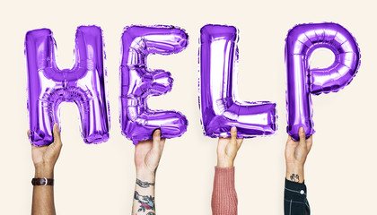 Purple alphabet balloons forming the word help