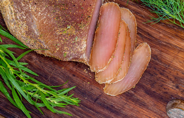 Sliced basturma covered with spices