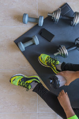 Dumbbell and mat training at home,