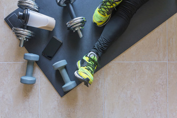 Dumbbell and mat training at home,