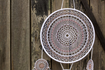 Handmade dream catcher with feathers threads and beads rope hanging