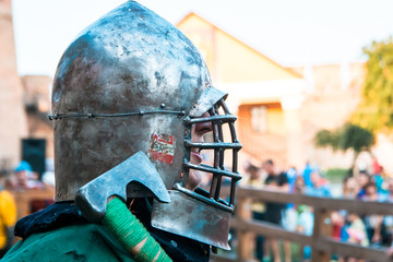Medieval knight in armor. Head. Helmet.