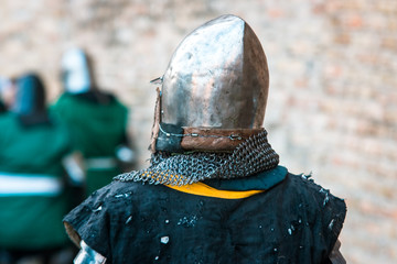Medieval knight in armor. Head. Helmet.