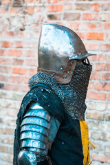 Medieval knight in armor. Head. Helmet.