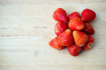 Fresh red strawberry on wood background for background,wallpaper,screensaver and copyspace,health...