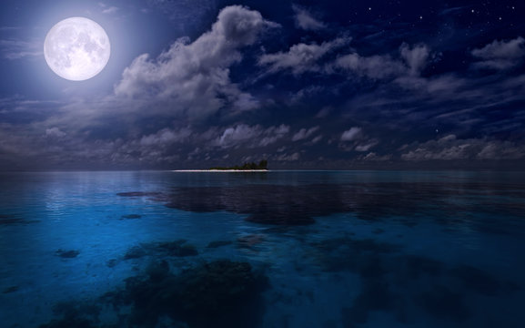 Full moon over the azure sea
