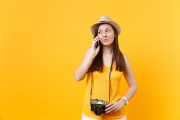 Tourist woman in summer hat talking on mobile phone, calling friend, booking taxi, hotel isolated...